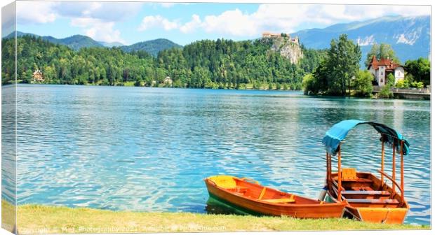 Boats at the Bled Island, Lake Bled, Slovenia. Canvas Print by M. J. Photography