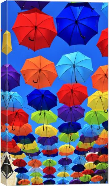 umbrella street, and it’s magical. Canvas Print by M. J. Photography