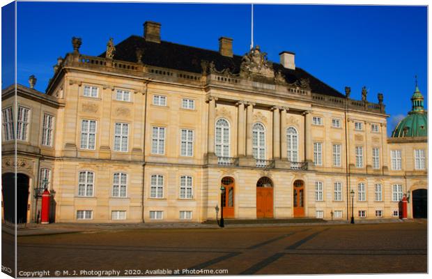 Amalienborg Palace - winter home of danish royal f Canvas Print by M. J. Photography