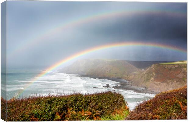 Morwenstow rainbow. Canvas Print by Ashley Cooper
