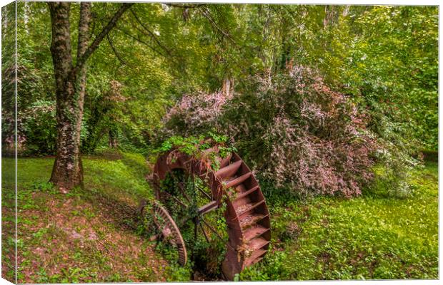 old rustic mill wheel in ax-les-thermes forest Canvas Print by Mario Koufios
