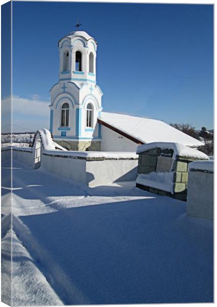 Village church in the snow Canvas Print by Martin Smith