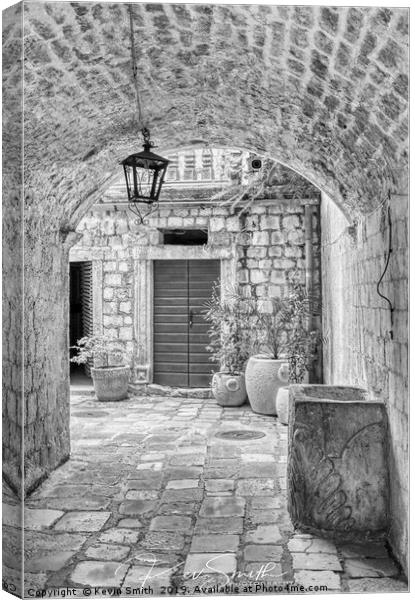 Archway in Kotor Town Montenegro Canvas Print by Kevin Smith