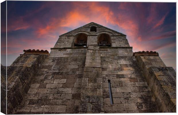 Romanesque stone church bell tower with amazing sky Canvas Print by David Galindo