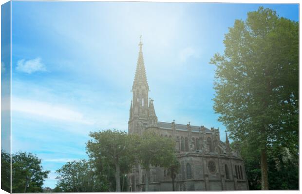 medieval church with bell tower with illuminated sky Canvas Print by David Galindo