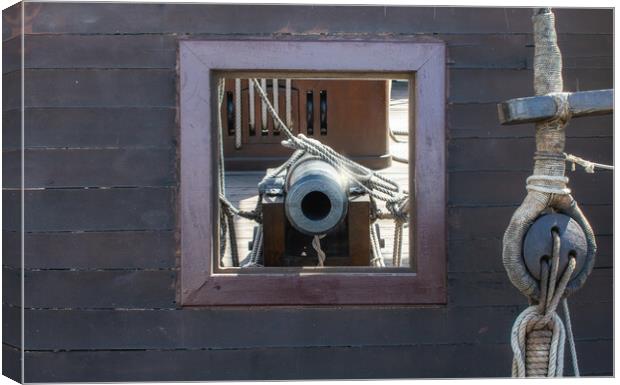 frontal view of cannon in its porthole Spanish galleon Canvas Print by David Galindo
