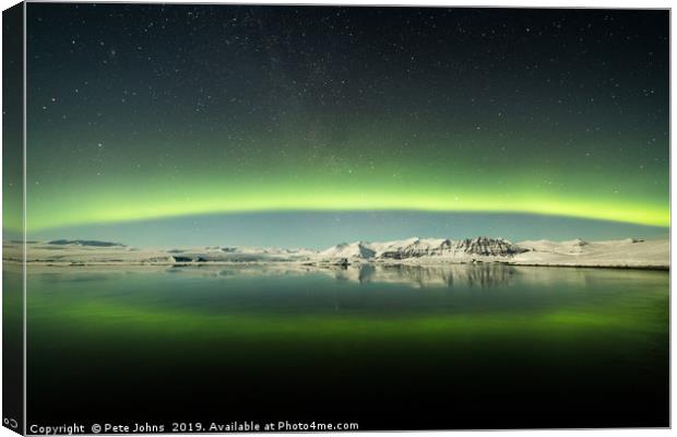 The Northern Lights reflection Canvas Print by Pete Johns