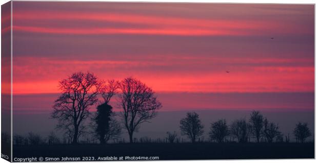 sunrise sky Canvas Print by Simon Johnson
