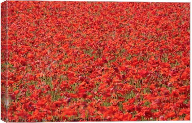 A fistfull of poppies Canvas Print by Simon Johnson