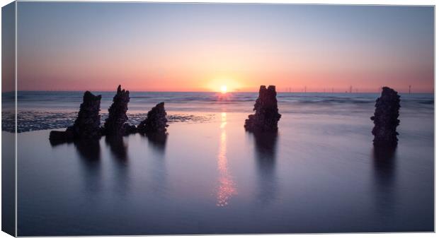 Shimmering Water around the Old Hoylake Shipwreck Canvas Print by Liam Neon