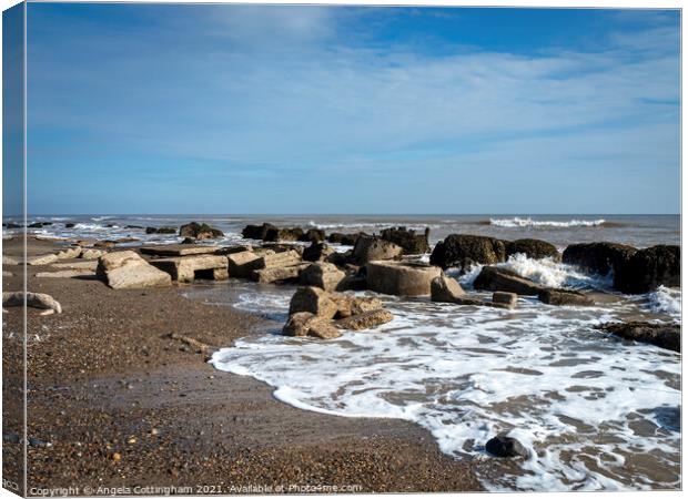 Blocks on the foreshore at Spurn Point Canvas Print by Angela Cottingham