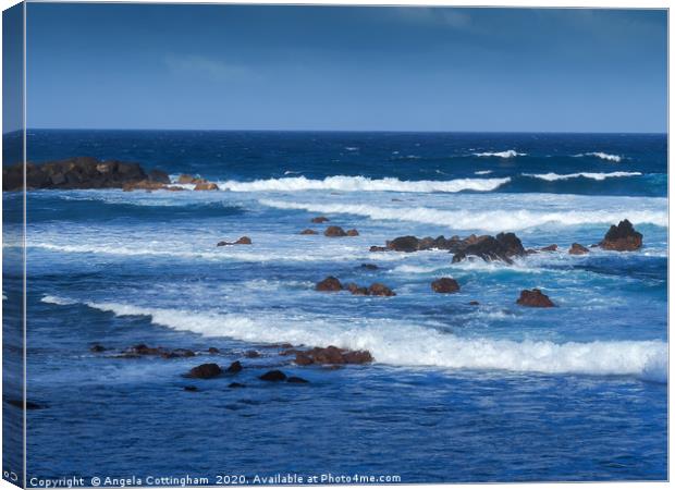 Waves at Puerto de la Cruz Canvas Print by Angela Cottingham