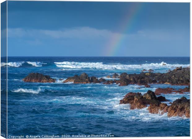 Waves and Rainbow at Puerto de la Cruz Canvas Print by Angela Cottingham