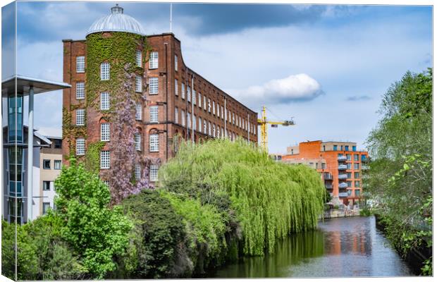 St James on the bank of the River Wensum, Norwich Canvas Print by Chris Yaxley