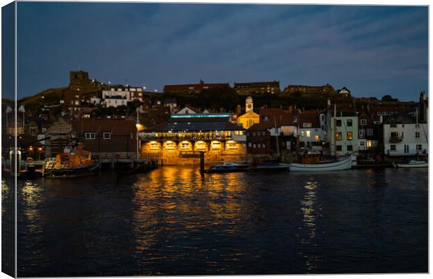 Whitby Harbour at dusk Canvas Print by Chris Yaxley