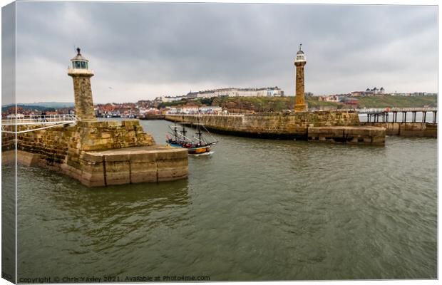 Boat leaving Whitby Harbour, North Yorkshire Canvas Print by Chris Yaxley