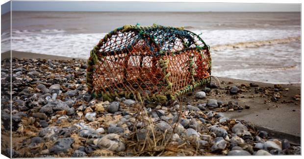Crab fishing pot on Cromer beach, Norfolk coast Canvas Print by Chris Yaxley