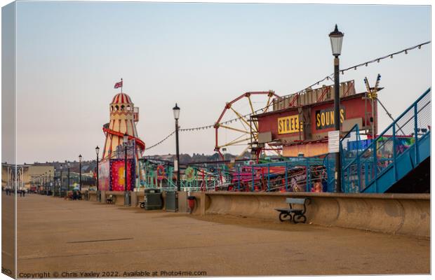 Funfair on the prom Canvas Print by Chris Yaxley