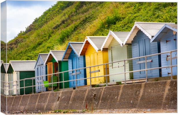 Seaside beach huts Canvas Print by Chris Yaxley