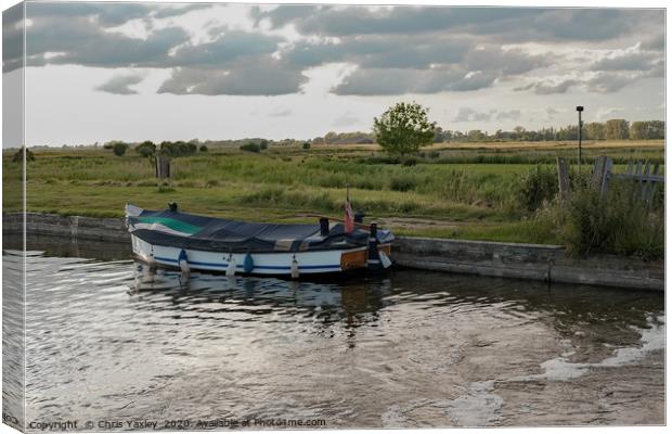 Moored on Thurne Dyke at dusk Canvas Print by Chris Yaxley