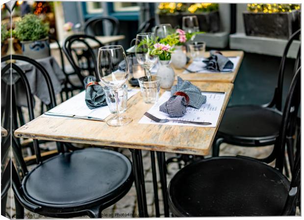Outdoor seating outside a Dutch restaurant Canvas Print by Chris Yaxley
