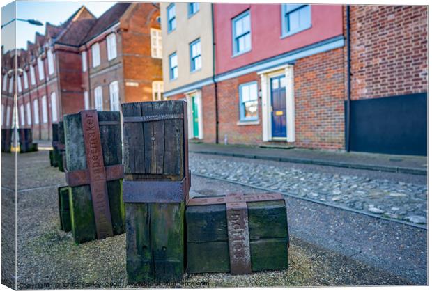 Wooden statues along Quayside, Norwich Canvas Print by Chris Yaxley