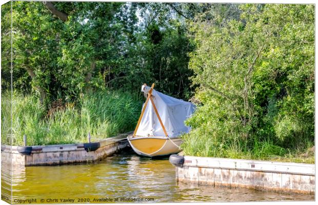 Wooden boat moored in the Norfolk Broads Canvas Print by Chris Yaxley