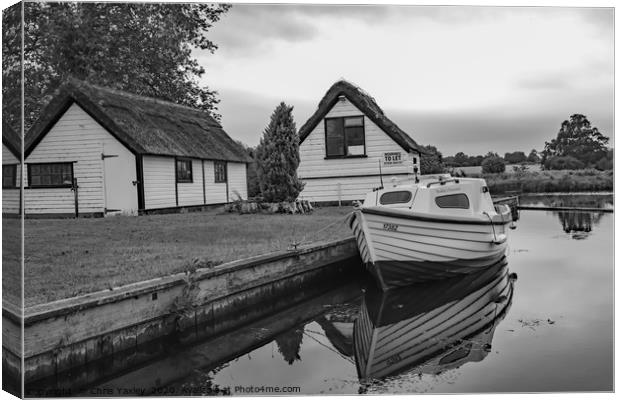 Boat and boat house on the River Bure Canvas Print by Chris Yaxley