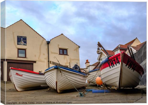 Low down and front on view of fishing boats Canvas Print by Chris Yaxley