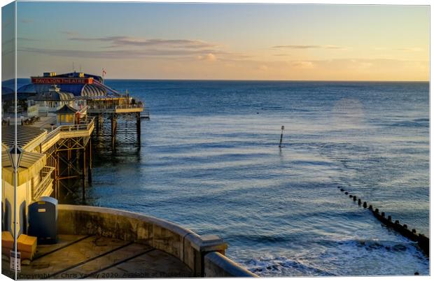 Cromer pier and promenade at sunrise Canvas Print by Chris Yaxley