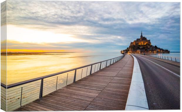 Le Mont Saint-Michel and the bridge over water in Normandy Canvas Print by Laurent Renault