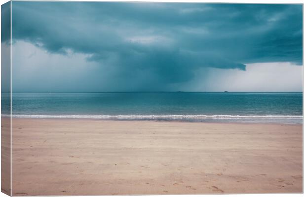 Unsettled dark sky over the beach in Brittany Canvas Print by Laurent Renault