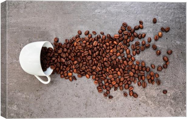 Spilled cup of coffee with beans  Canvas Print by Laurent Renault