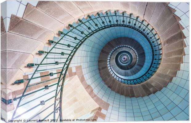 Spiral stairs and blue opaline inside the lighthouse Canvas Print by Laurent Renault