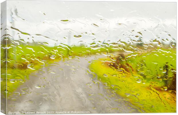 Abstract image of rural road, through the wet window Canvas Print by Laurent Renault