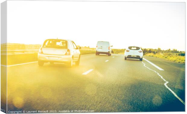 On blur traffic road with colorful bokeh light abstract. Real tr Canvas Print by Laurent Renault