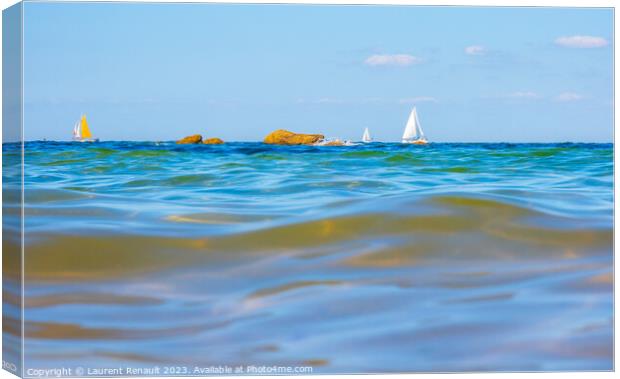 Boats and waves seen by a swimmer at sea level, photography take Canvas Print by Laurent Renault