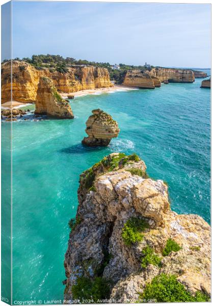 Vertical photography of spectacular cliffs near Marinha beach an Canvas Print by Laurent Renault