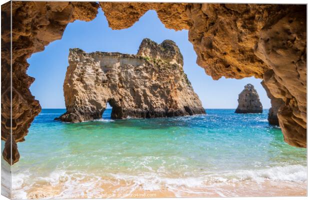 Small, heavenly beach photographed from cave, near Portimão, Al Canvas Print by Laurent Renault
