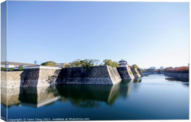 Fortification and ditch water around Osaka Castle for protection Canvas Print by Yann Tang