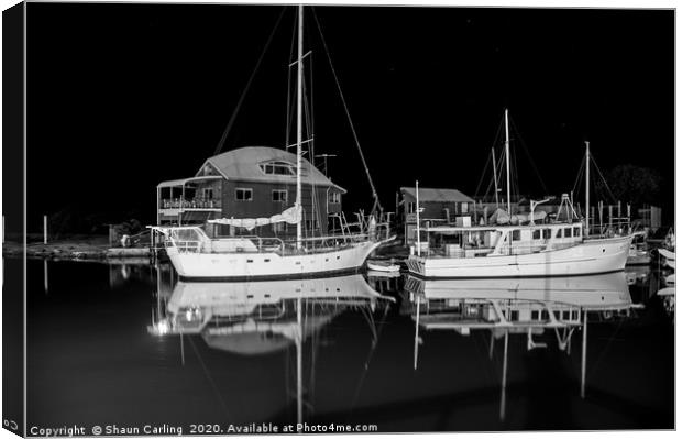 Yachts At Night Canvas Print by Shaun Carling