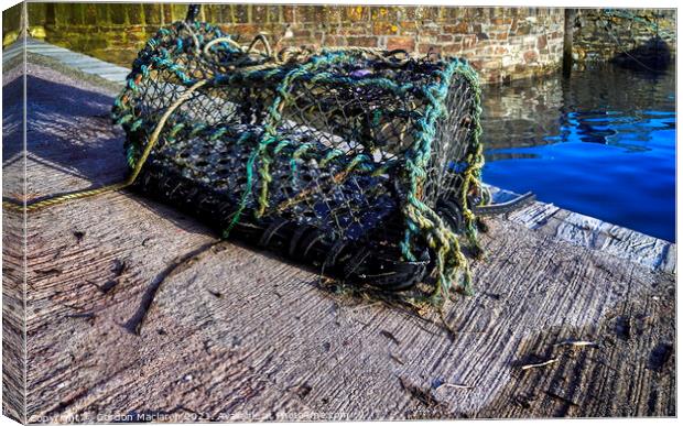 Lobster pot on the quay in Mevagissey Harbour Canvas Print by Gordon Maclaren