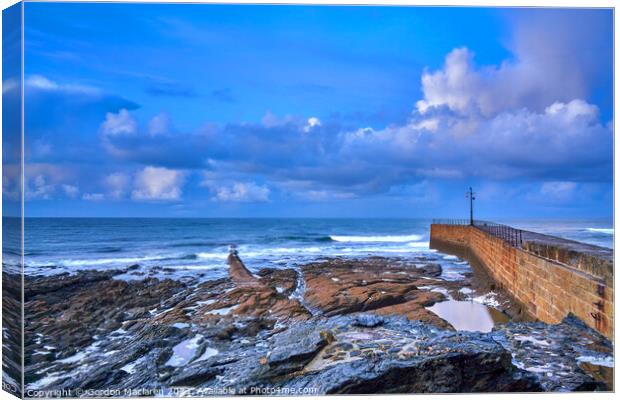 Sunrise over Porthleven Beach and jetty, Cornwall Canvas Print by Gordon Maclaren