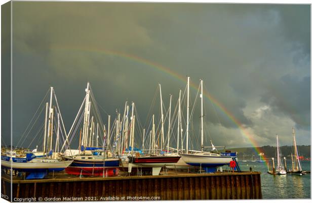 Rainbow over the boats docked in Falmouth Harbour Canvas Print by Gordon Maclaren