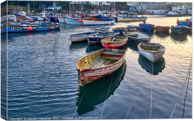 Boats moored in Mevagissey Harbour, Cornwall, England Canvas Print by Gordon Maclaren