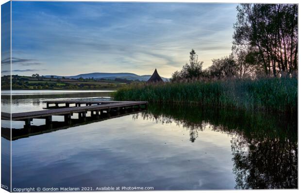 Evening at the Crannog, Llangorse Lake Canvas Print by Gordon Maclaren