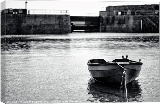 Boat moored in Mousehole Harbour Cornwall Canvas Print by Gordon Maclaren