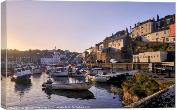 Boats moored in Mevagissey Harbour, Cornwall Canvas Print by Gordon Maclaren