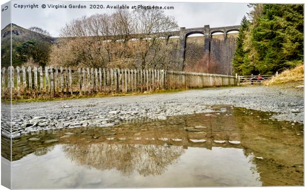 Claerwen Dam Reflection Canvas Print by Gordon Maclaren