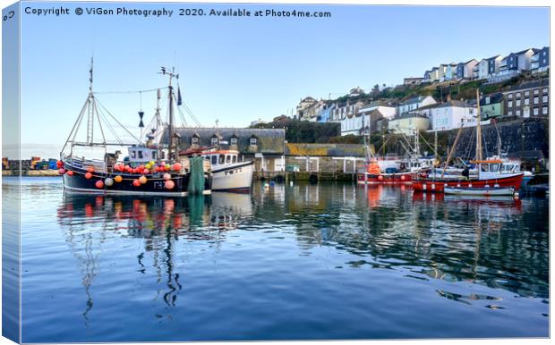 Reflections on Mevagissey harbour Canvas Print by Gordon Maclaren